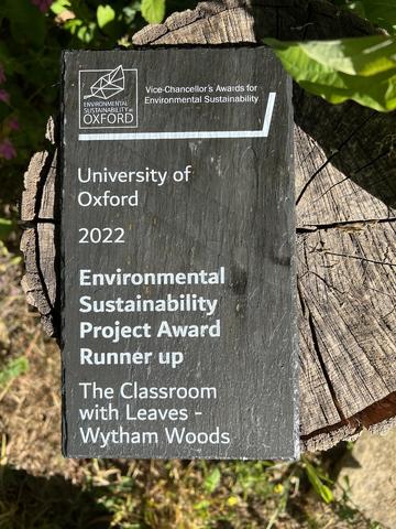 An image of the slate award; "Environmental Sustainability Project Award Runner Up: The Classroom with Leaves - Wytham Woods"